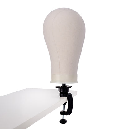 wig & topper starter kit aftercare mannequin head on tabletop for styling and support.
